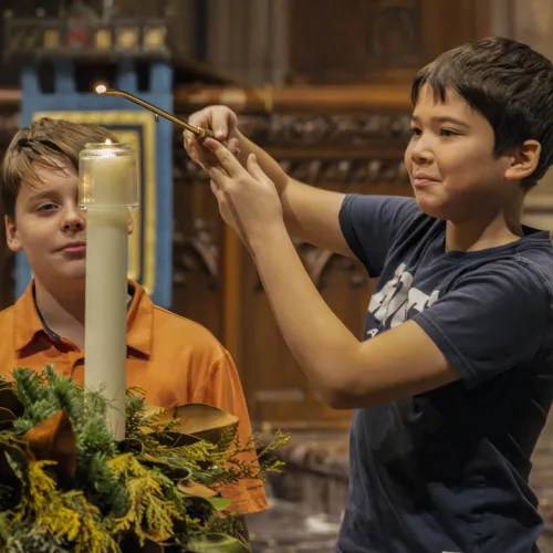 Kids light advent candles